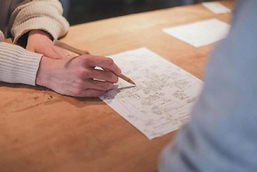 Taketa station hostel cue