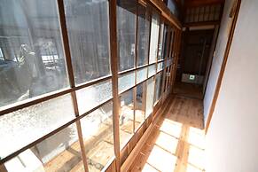 Taketa station hostel cue