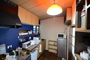 Taketa station hostel cue