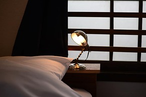 Taketa station hostel cue