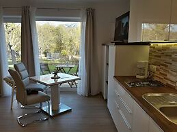 Pr`fik Apartments