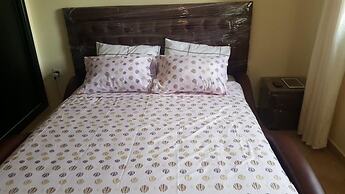 Lilac's garden Vue piscine