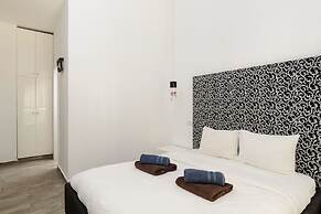 Family Apt & Private Garden near Beach by FeelHome