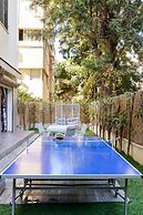 Family Apt & Private Garden near Beach by FeelHome