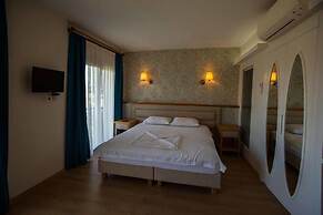 Clementine Suits Sigacik