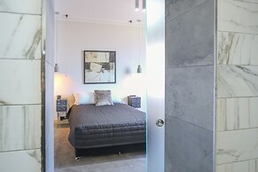 Indulge Apartments -The Urban Collection