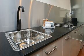 Indulge Apartments -The Urban Collection