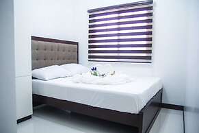 V and G Suites Limay