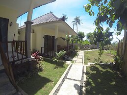 Pemuntalan Guesthouse by WizZeLa