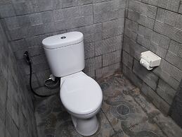 Pemuntalan Guesthouse by WizZeLa