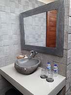 Pemuntalan Guesthouse by WizZeLa