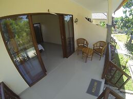 Pemuntalan Guesthouse by WizZeLa