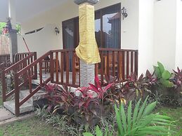 Pemuntalan Guesthouse by WizZeLa