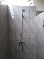 Pemuntalan Guesthouse by WizZeLa