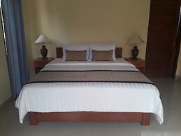 Pemuntalan Guesthouse by WizZeLa