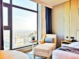 Ramada Plaza Dongxing City Center