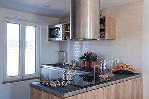 Craveiral Farmhouse by Belong
