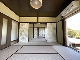Tsubaki House