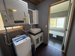 Tsubaki House