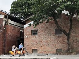 Cosmos Hotel Huashan Town