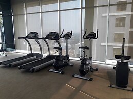 Highrise Cityview Aspire Condo Gym Pool
