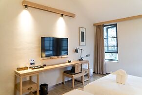 Dali Lridescent Clouds Hotel