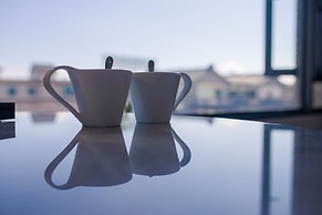 Dali Lridescent Clouds Hotel