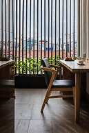 Triple E Hotel Fine Art Museum