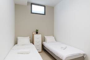 Elegant Duplex with XL Patio by FeelHome