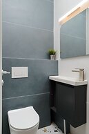 Elegant Duplex with XL Patio by FeelHome