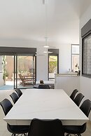 Elegant Duplex with XL Patio by FeelHome