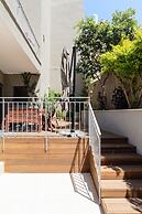 Elegant Duplex with XL Patio by FeelHome