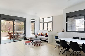 Elegant Duplex with XL Patio by FeelHome