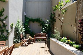 Elegant Duplex with XL Patio by FeelHome