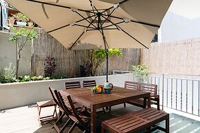 Elegant Duplex with XL Patio by FeelHome