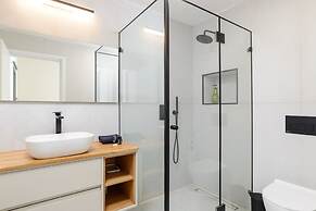 Elegant Duplex with XL Patio by FeelHome