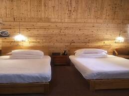 Nanjing Tulou Qingdelou Inn