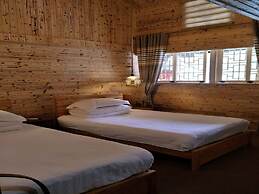 Nanjing Tulou Qingdelou Inn