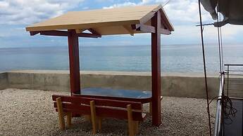 Luzmin BH - Beachfront Cottages