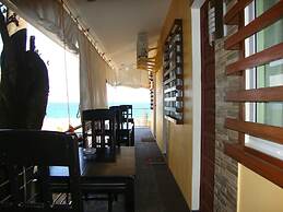 Luzmin BH - Beachfront Cottages