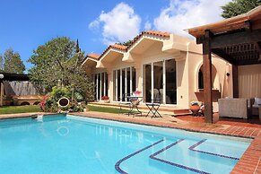 Oasis Pool House by GHH