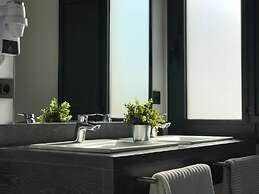 Uma Suites Parada del Marqués