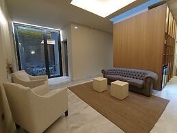 Uma Suites Parada del Marqués