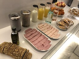 Uma Suites Parada del Marqués