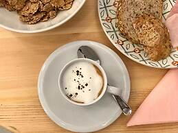 Uma Suites Parada del Marqués