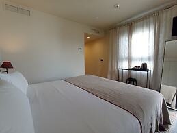 Uma Suites Parada del Marqués