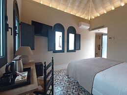 Uma Suites Parada del Marqués