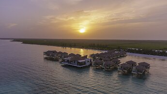 Palafitos Overwater Bungalows, Catamarán, Cenote & More Inclusive