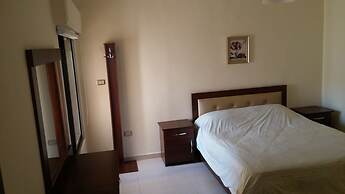 Cozy Dair Ghbar Apartments
