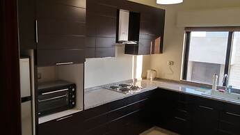 Cozy Dair Ghbar Apartments